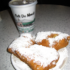 coffee behind beignets